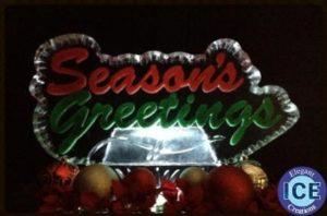 Seasons greatings with color ice sculpture